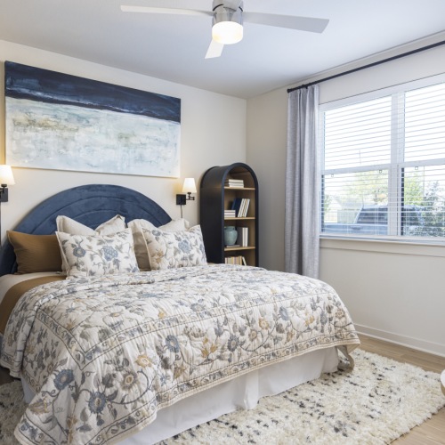 Spacious bedroom with large windows